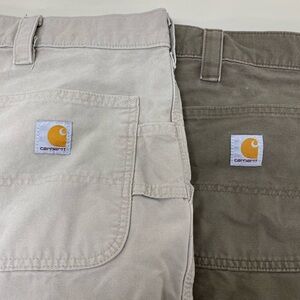 2 Carhartt Men’s short Waist size 48 in great condition no tear or damages clean